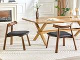 2 walnut colored solid wood dining chairs, with black PU soft cushions and curved backrests that fit W1151P436187