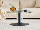 27.5-inch diameter round tempered glass coffee table. 17.7 inches high, supported by a black metal W1512P510326