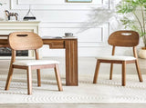 2 walnut colored solid wood dining chairs, white PU soft seat cushions, hollowed out backrests, and W1151P455539