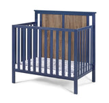 Connelly Mini Crib With Mattress Pad Midnight Blue/Vintage Walnut B022P204870
