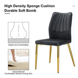 Four black dining chairs. A medieval modern chair made of PU material soft cushions, equipped W1151135498