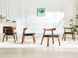 2 walnut colored solid wood dining chairs, with black PU soft cushions and curved backrests that fit W1151P436187