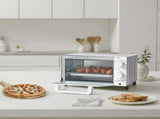 4 Slice Countertop Toaster Oven with 3 Settings, Includes Baking Rack and Pan, Arctic White, New 97746124