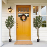 Large artificial curved branches of green plants simulate courtyard garden door W2945P278480