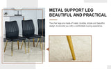 Four black dining chairs. A medieval modern chair made of PU material soft cushions, equipped W1151135498