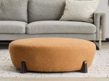 Modish Round Ottoman Boucle Top with Splayed Rubber Wood Legs, Pumpkin Orange N769P346256O