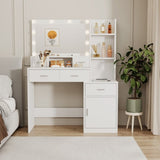 The white vanity with a mirror is equipped with a hair dryer rack, while the vanity in the bedroom W1320P186705