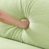 The 53-inch green sofa offers a spacious layout in the small apartment, easily handling various W3371P309475