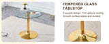 A 35-inch diameter glass top and a modern, minimalist round dining table with gold metal legs. Ideal W1151P263755