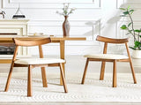 2 walnut colored solid wood dining chairs, with white PU soft cushions and curved backrests that fit W1512P510307