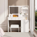 The white vanity with a mirror is equipped with a hair dryer rack, while the vanity in the bedroom W1320P186705