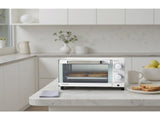 4 Slice Countertop Toaster Oven with 3 Settings, Includes Baking Rack and Pan, Arctic White, New 97746124
