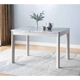 Faux marble white dining table top Four rounded leg posts Rounded table corners White Oak leg color B107P355284