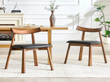 2 walnut colored solid wood dining chairs, with black PU soft cushions and curved backrests that fit W1151P436187